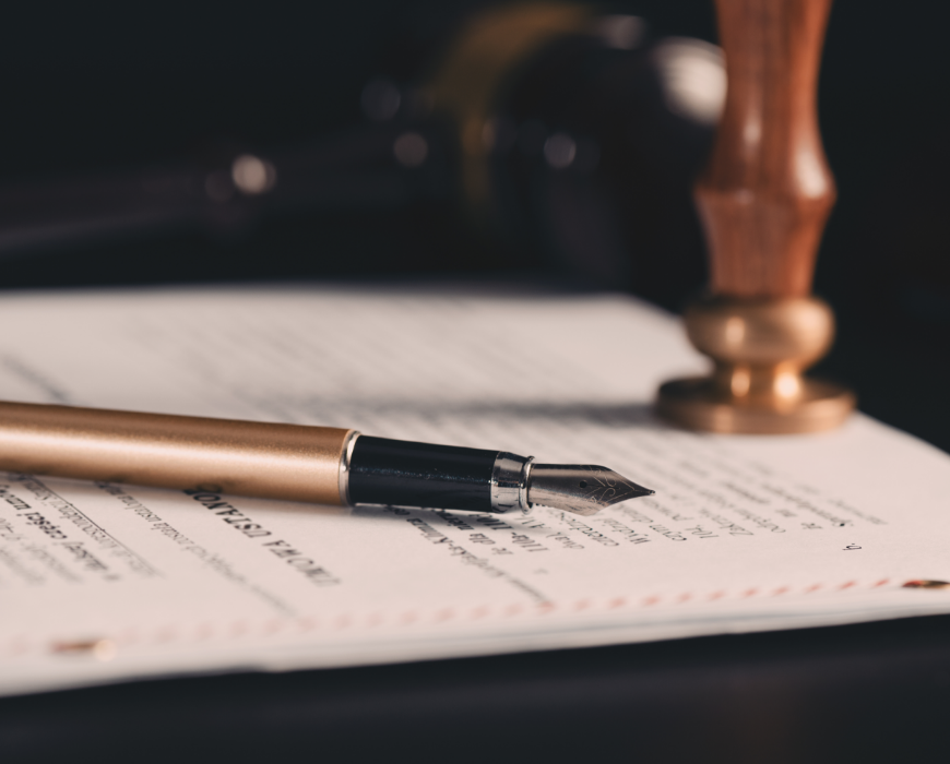 document on desk with pen and stamp document on desk with pen and stamp