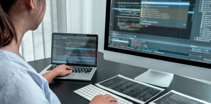 female programmer at desk female programmer at desk