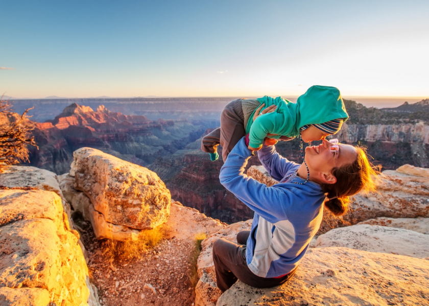 woman holding child at Grand Canyon woman holding child at Grand Canyon